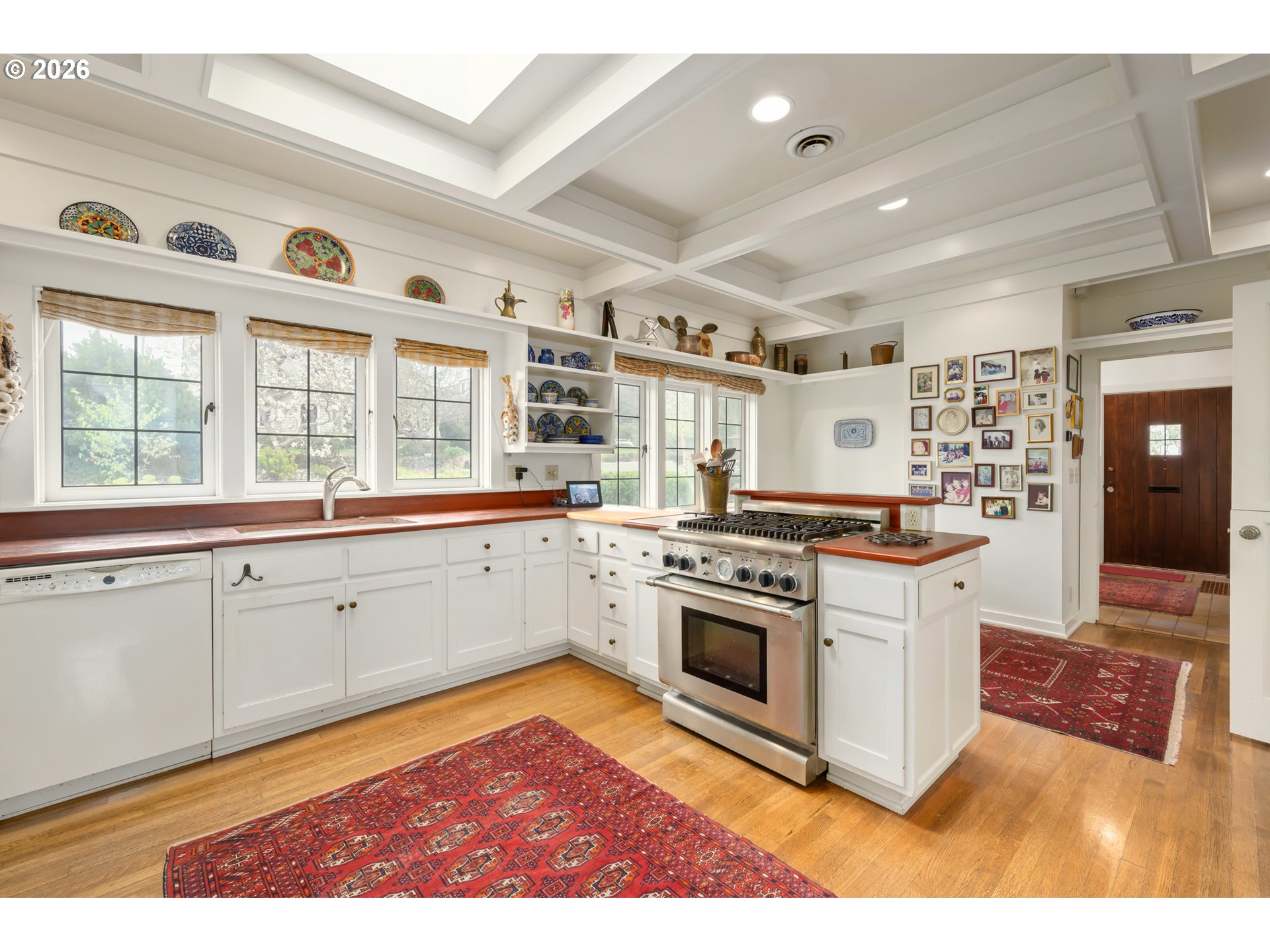 2223 Olive Street Eugene, OR 97405 - Photo 9 of 44 a kitchen with granite countertop a stove and cabinets