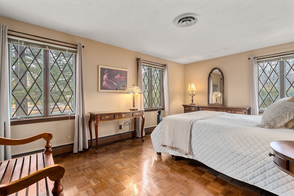 1640 Commonwealth Avenue Newton, MA 02465 - Photo 14 of 27 a bed room with a bed and a window