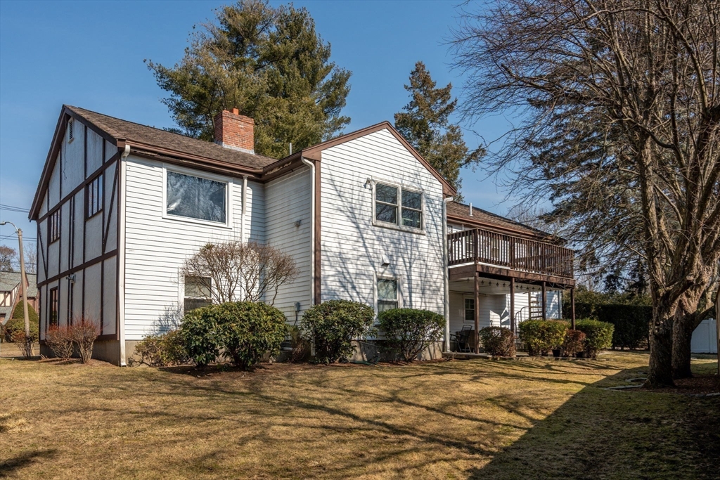 1640 Commonwealth Avenue Newton, MA 02465 - Photo 23 of 27 a front view of a house with a yard
