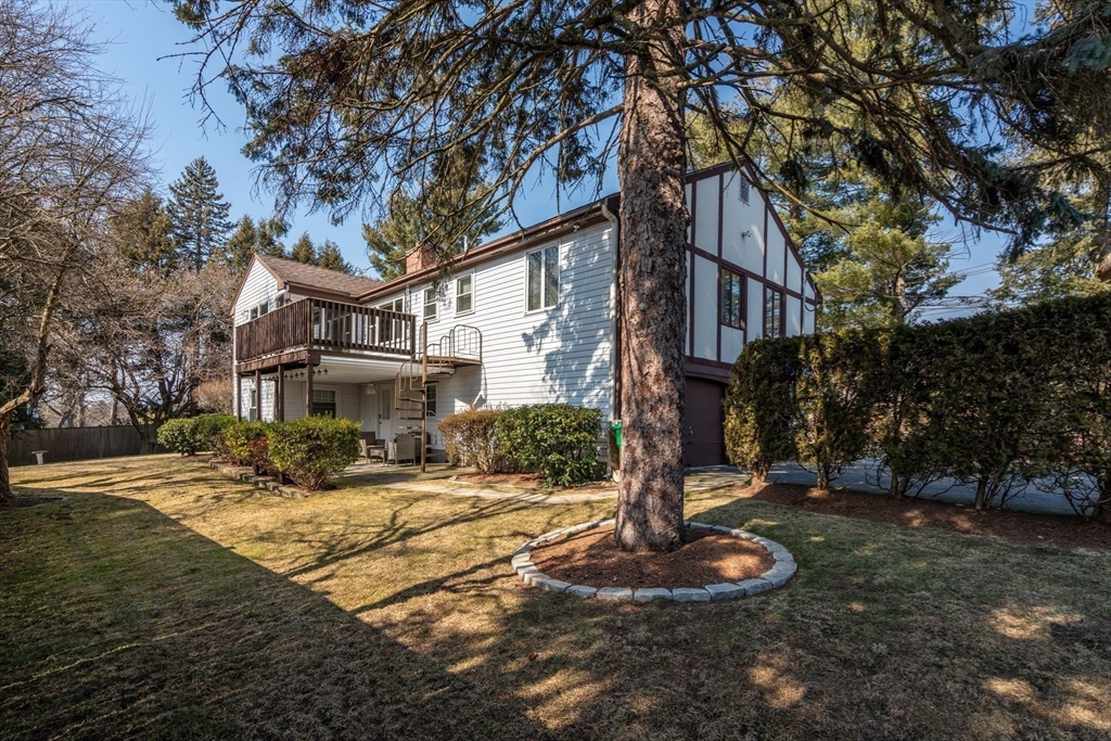 1640 Commonwealth Avenue Newton, MA 02465 - Photo 24 of 27 a front view of a house with a yard