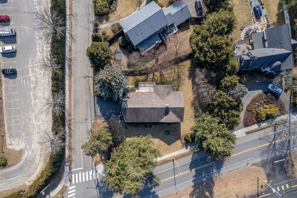 1640 Commonwealth Avenue Newton, MA 02465 - Photo 25 of 27 an aerial view of a house with a garden