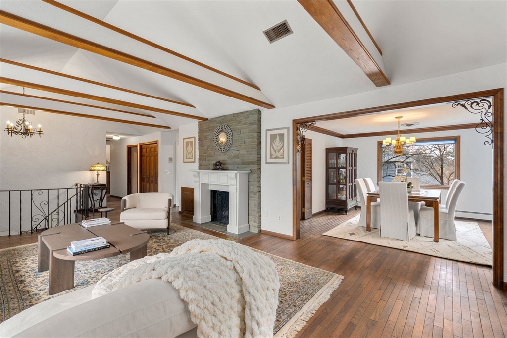 1640 Commonwealth Avenue Newton, MA 02465 - Photo 7 of 27 a living room with furniture and a fireplace