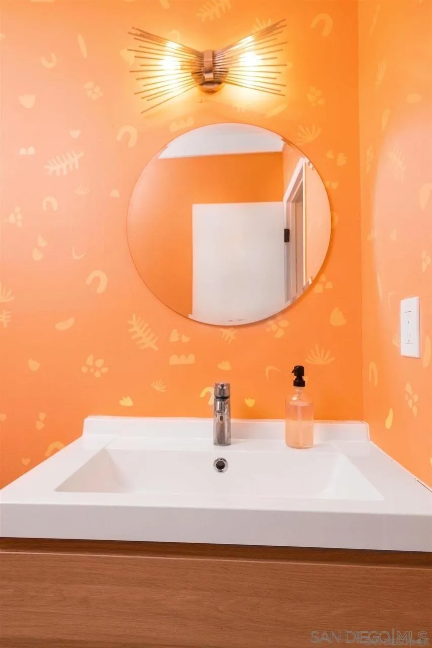 1195 Canyon Road Twentynine Palms, CA 92277 - Photo 12 of 26 a bathroom with a sink and a mirror
