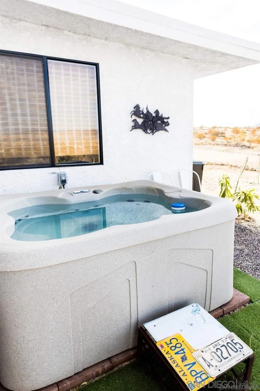 1195 Canyon Road Twentynine Palms, CA 92277 - Photo 19 of 26 a bathroom with a sink and a mirror