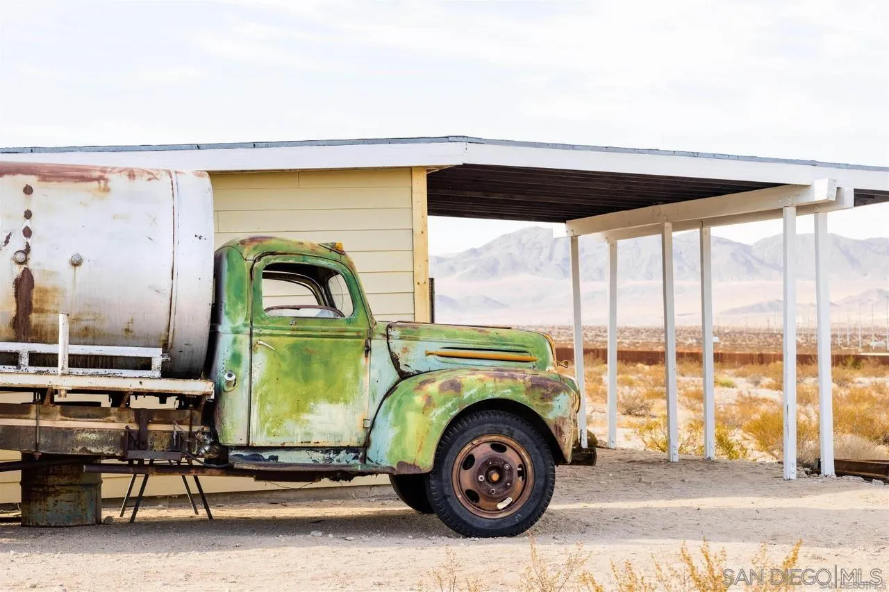 1195 Canyon Road Twentynine Palms, CA 92277 - Photo 21 of 26 a car parked in front of a house