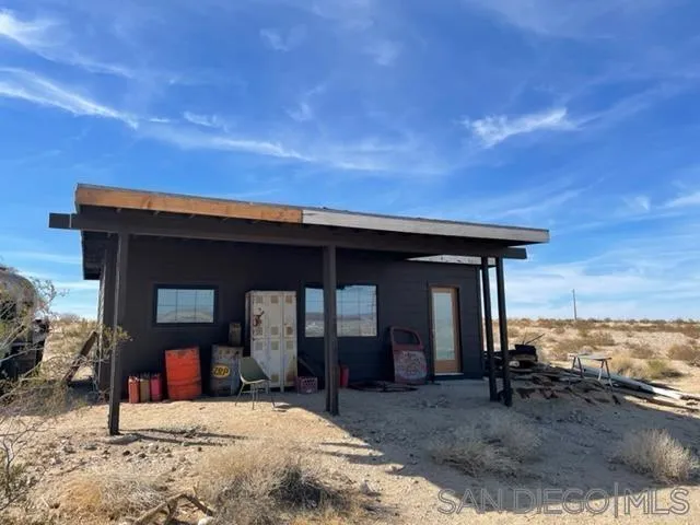 1195 Canyon Road Twentynine Palms, CA 92277 - Photo 22 of 26 a view of a house with backyard