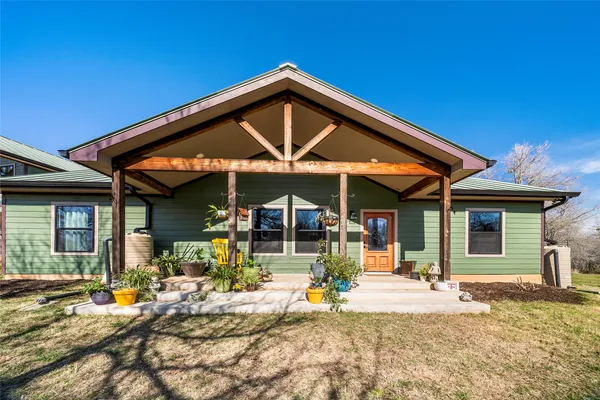 a view of a house with a patio
