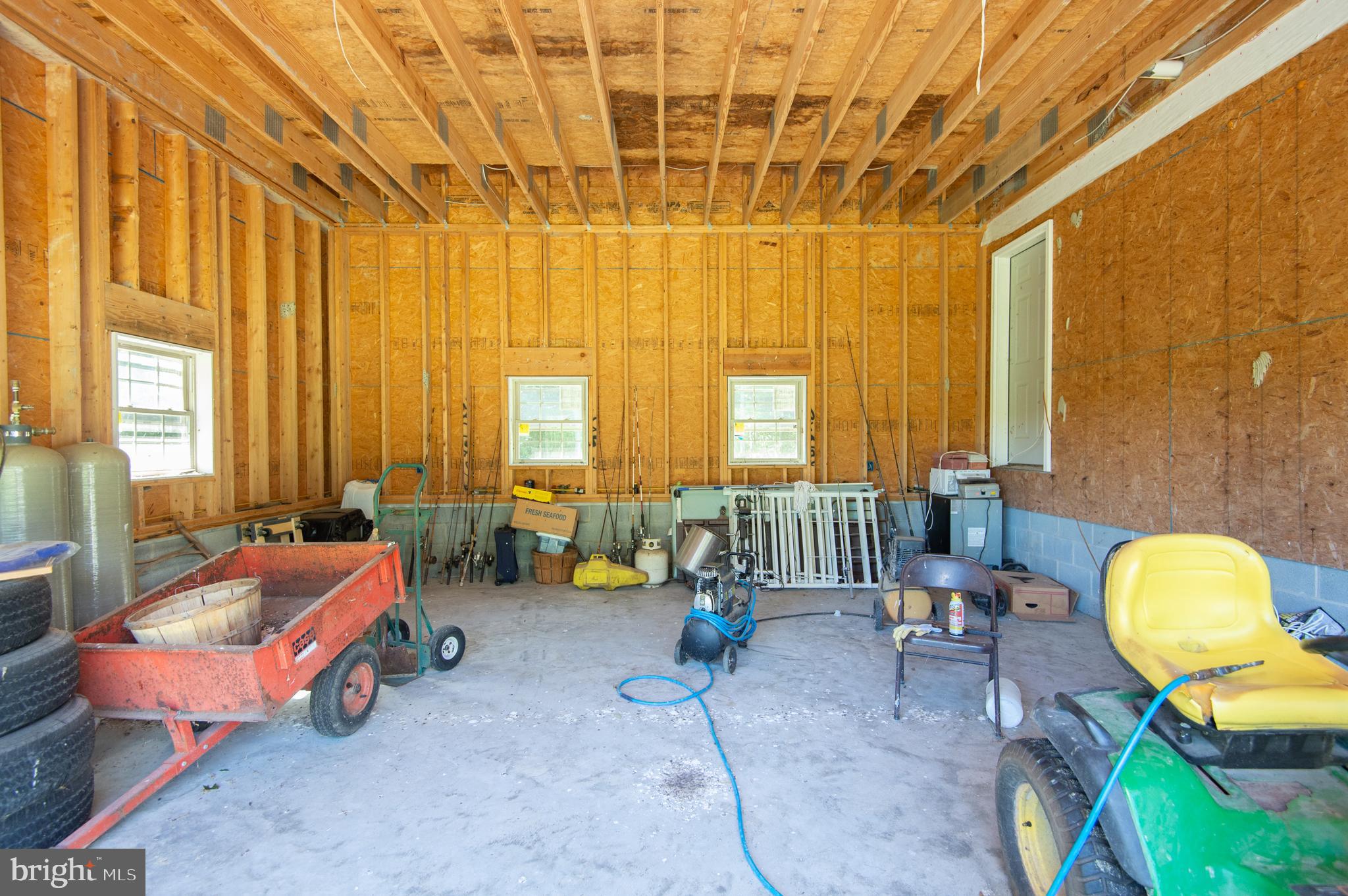 4036 Bestpitch Ferry Road Cambridge, MD 21613 - Photo 32 of 34 2 car attached garage w/expansion above