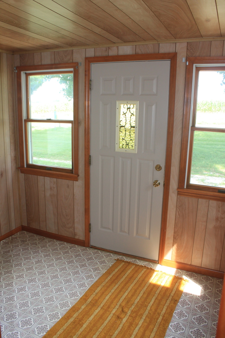 18918 Fairhaven Road Chadwick, IL 61014 - Photo 9 of 18 an empty room with windows