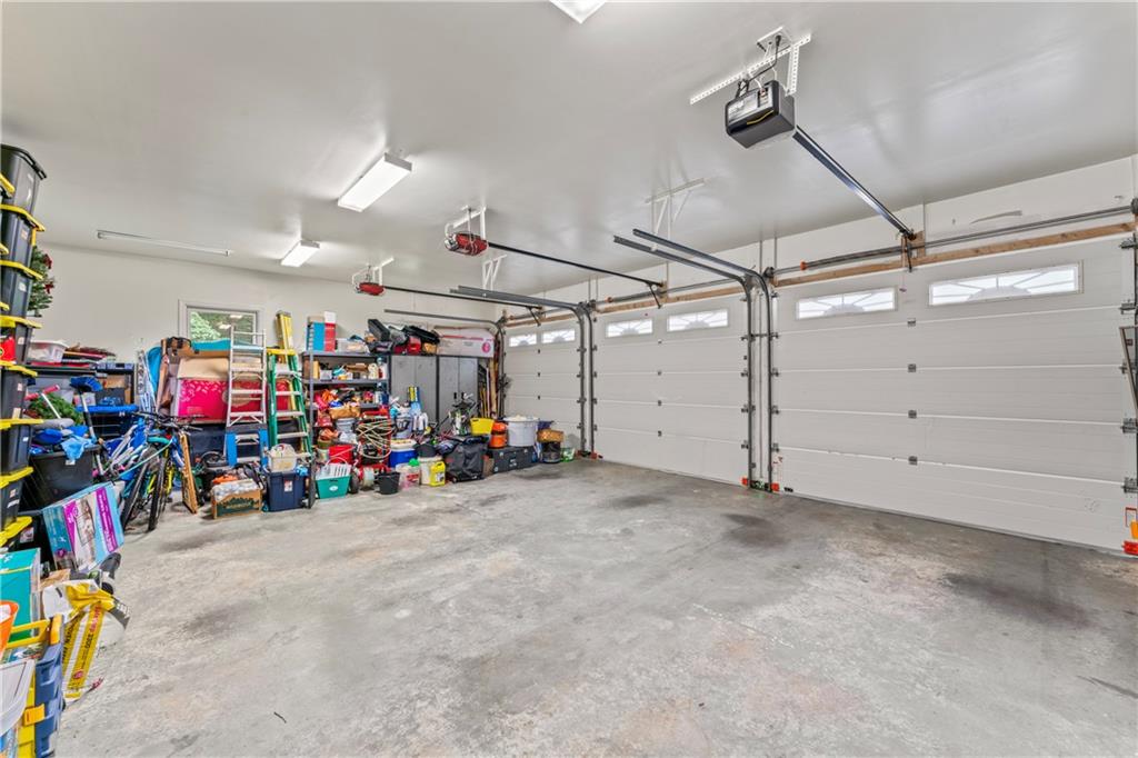 320 Holly Lane Walhalla, SC 29691 - Photo 20 of 41 This spacious garage offers ample room for vehicles and storage, perfect for any homeowner.