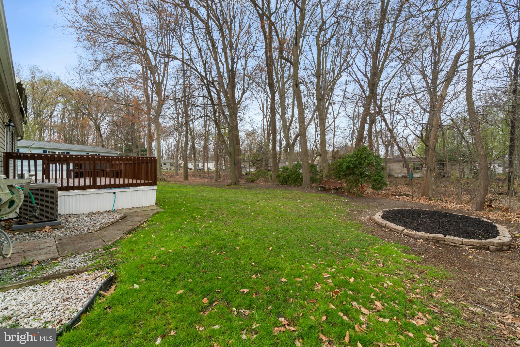 151 Robin Drive West Deptford, NJ 08066 - Photo 15 of 17 a view of a backyard with large trees