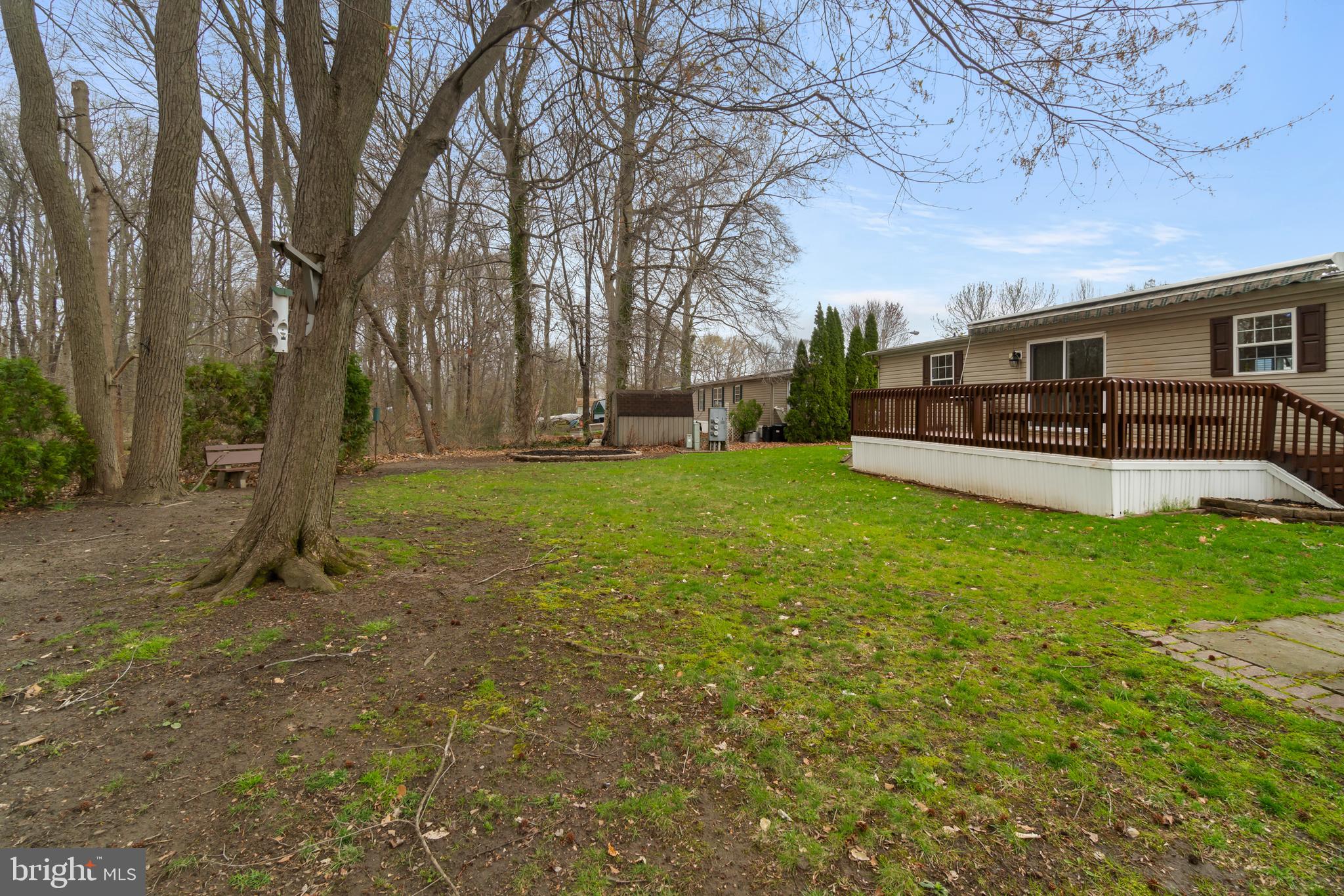 151 Robin Drive West Deptford, NJ 08066 - Photo 16 of 17 a view of a house with a big yard and large tree