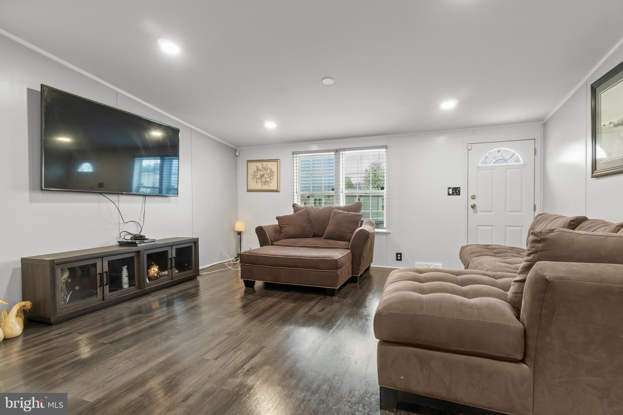 151 Robin Drive West Deptford, NJ 08066 - Photo 4 of 17 a living room with furniture and a flat screen tv