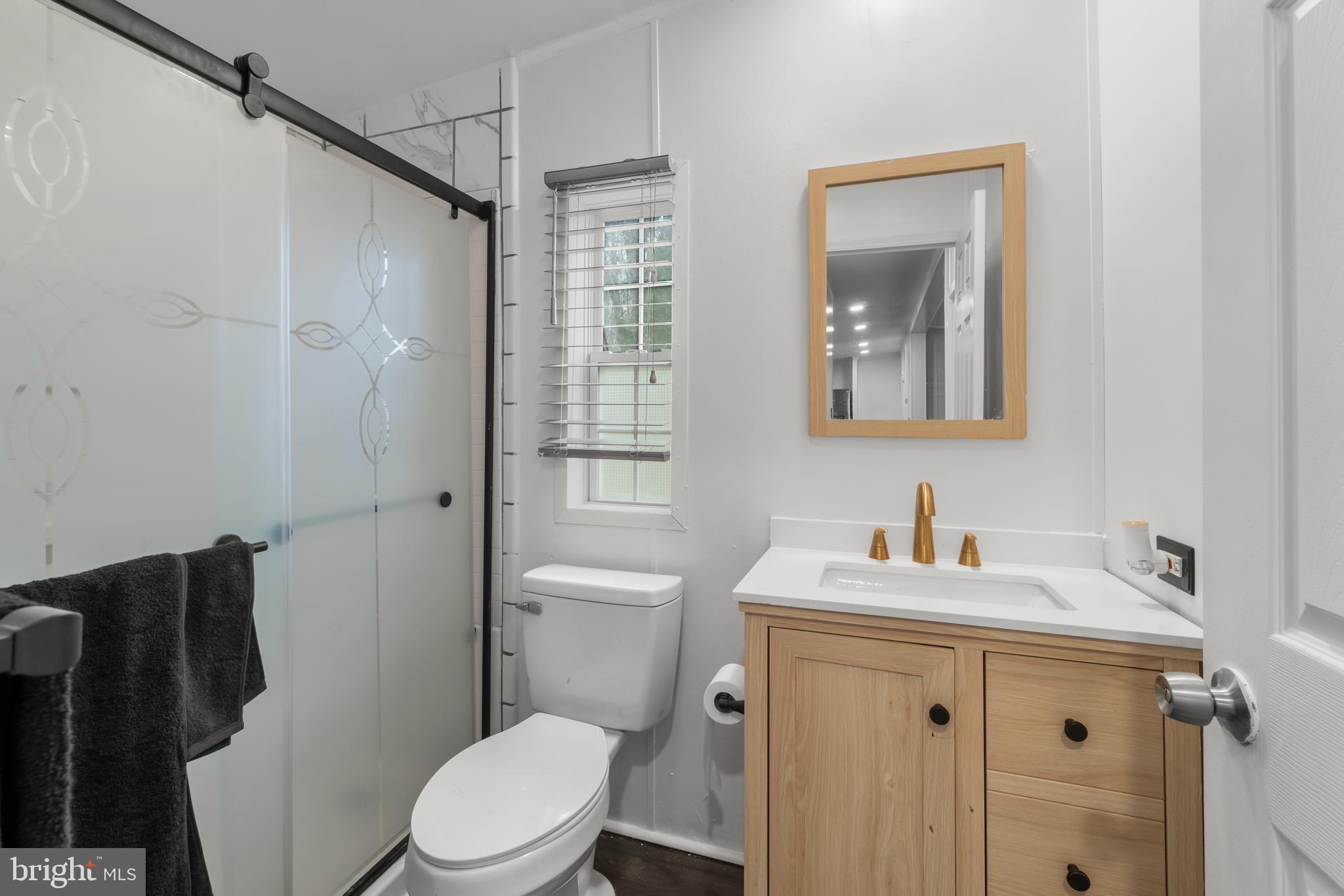 151 Robin Drive West Deptford, NJ 08066 - Photo 10 of 17 a bathroom with a sink toilet and shower