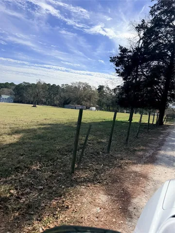 a view of lake view with lots of trees