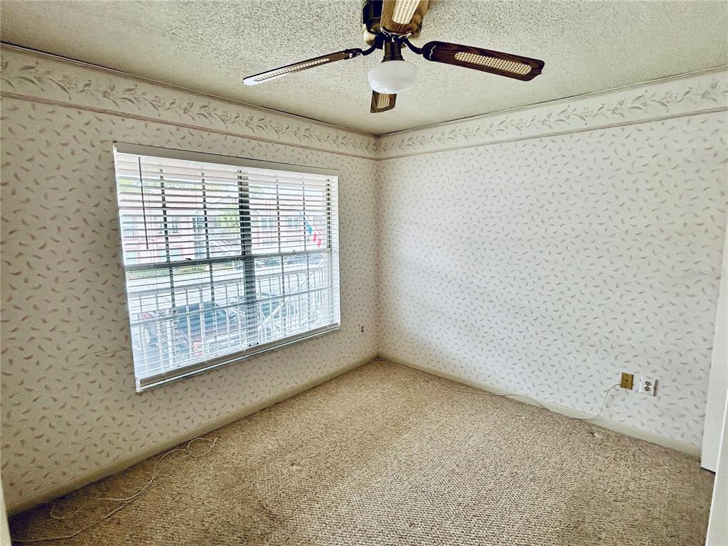 4826 Myrtle Oak Drive, Unit 23 New Port Richey, FL 34653 - Photo 15 of 42 a view of an empty room with a window