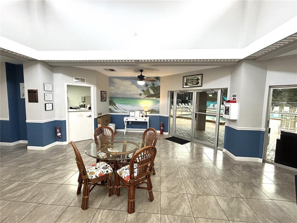 4826 Myrtle Oak Drive, Unit 23 New Port Richey, FL 34653 - Photo 24 of 42 a view of a dining room with furniture