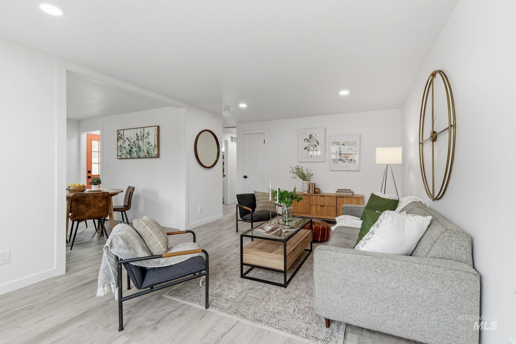 6123 South Brian Way Boise, ID 83716 - Photo 11 of 50 Living area featuring light wood-style flooring and recessed lighting