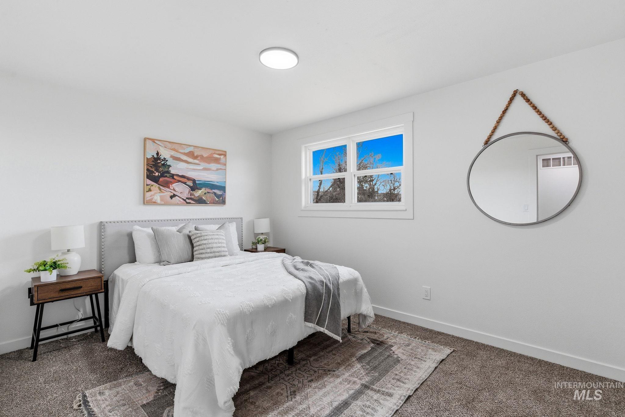 6123 South Brian Way Boise, ID 83716 - Photo 24 of 50 Carpeted bedroom with baseboards