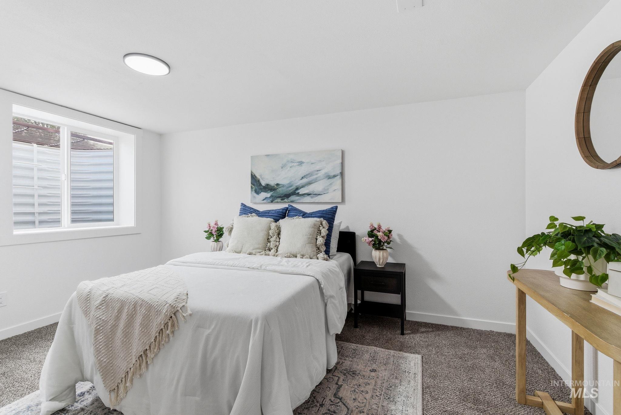 6123 South Brian Way Boise, ID 83716 - Photo 28 of 50 Carpeted bedroom with baseboards