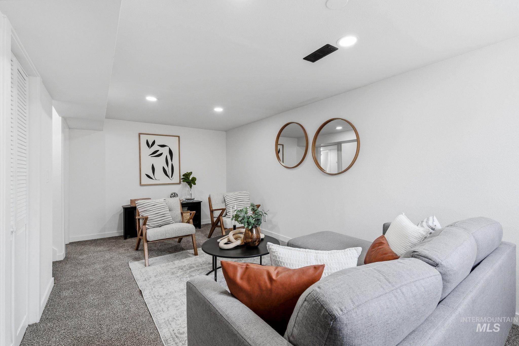 6123 South Brian Way Boise, ID 83716 - Photo 35 of 50 Carpeted living room with recessed lighting and baseboards