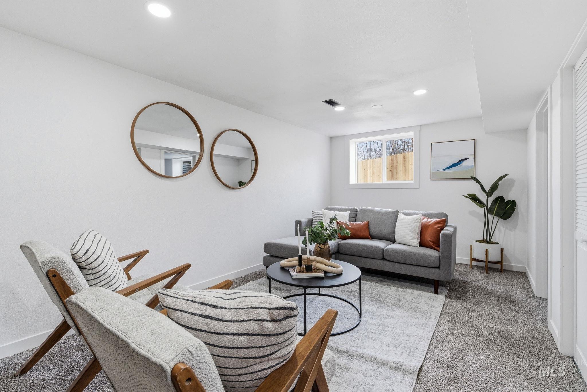6123 South Brian Way Boise, ID 83716 - Photo 36 of 50 Living room featuring light carpet and recessed lighting