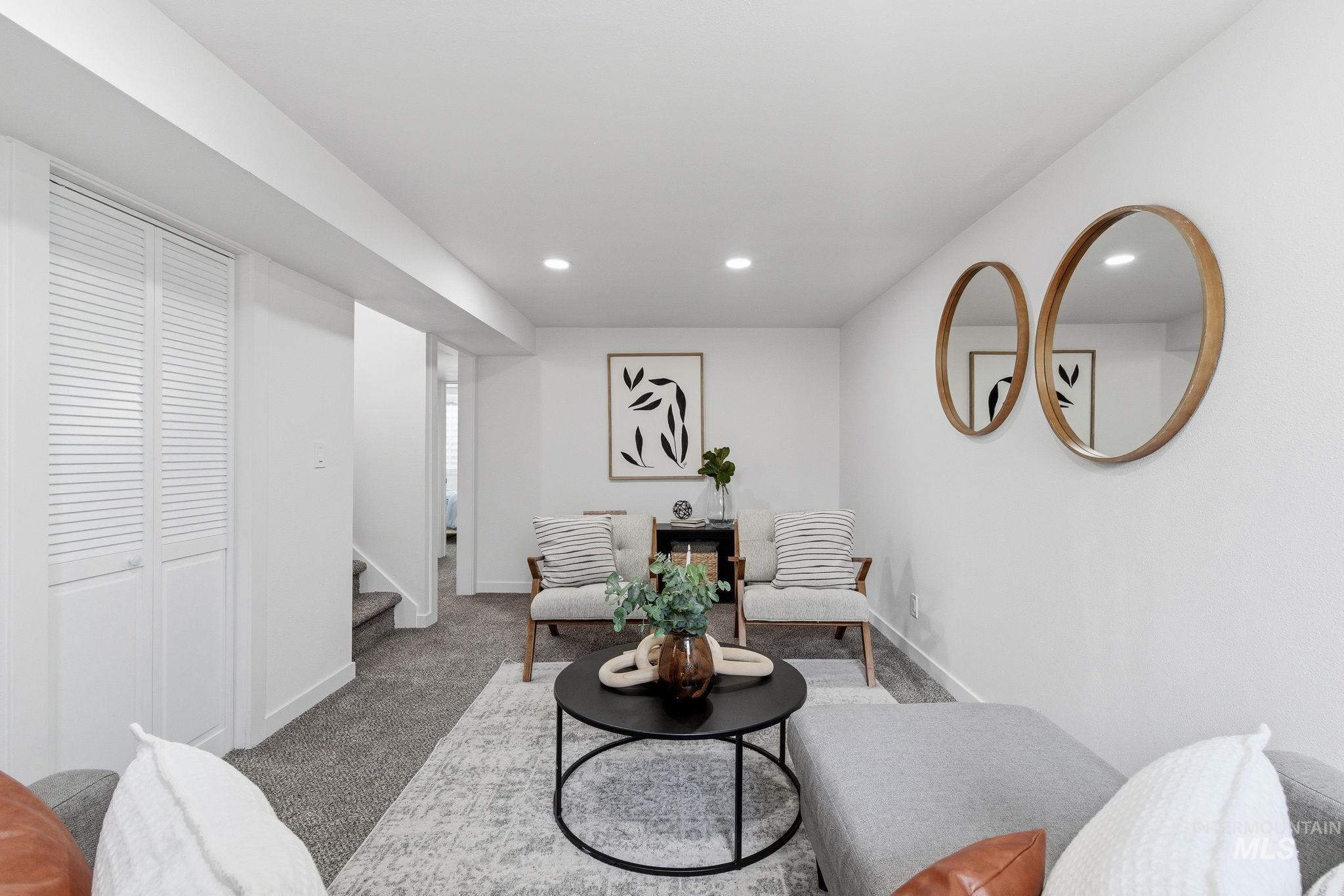 6123 South Brian Way Boise, ID 83716 - Photo 37 of 50 Living area featuring carpet flooring and recessed lighting