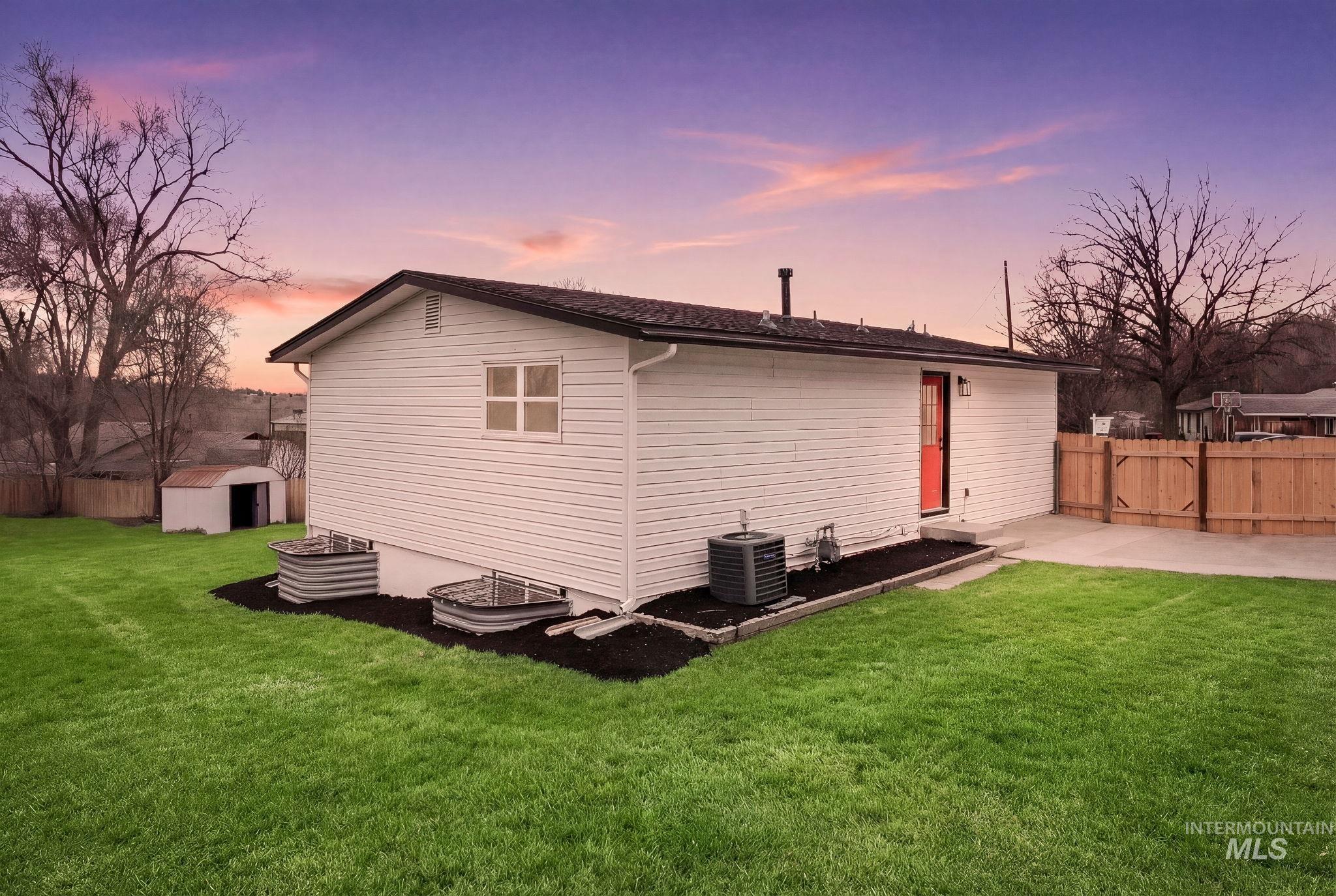 6123 South Brian Way Boise, ID 83716 - Photo 40 of 50 Rear view of house featuring an outbuilding