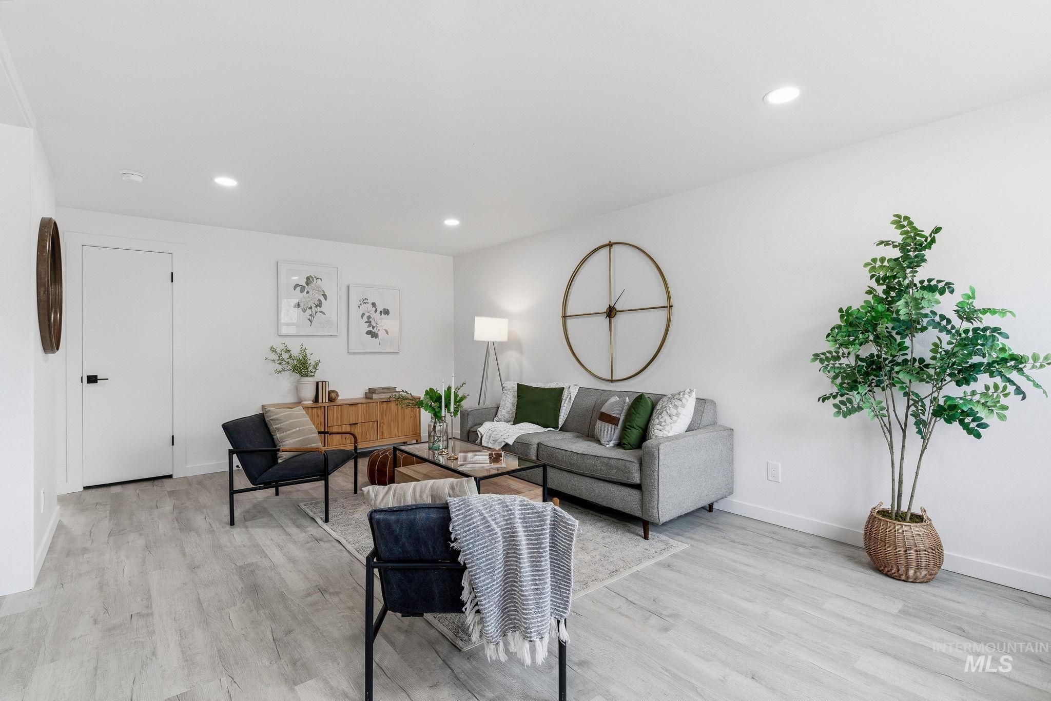 6123 South Brian Way Boise, ID 83716 - Photo 9 of 50 Living area featuring light wood-type flooring and recessed lighting