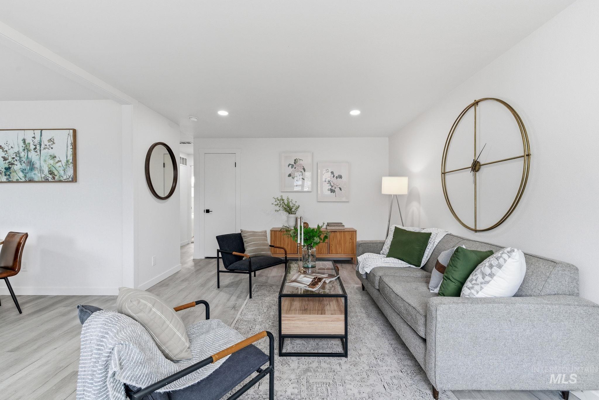 6123 South Brian Way Boise, ID 83716 - Photo 10 of 50 Living room with light wood-style flooring and recessed lighting