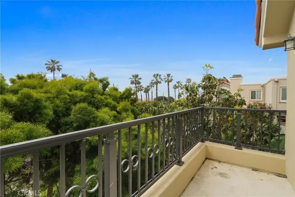 a view of a balcony with an outdoor space