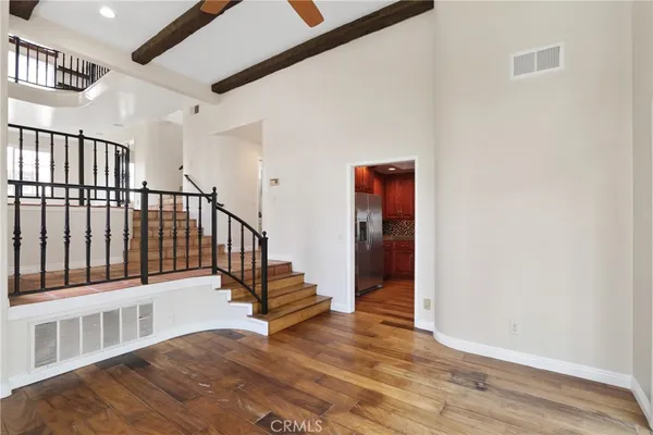 a view of entryway with wooden floor