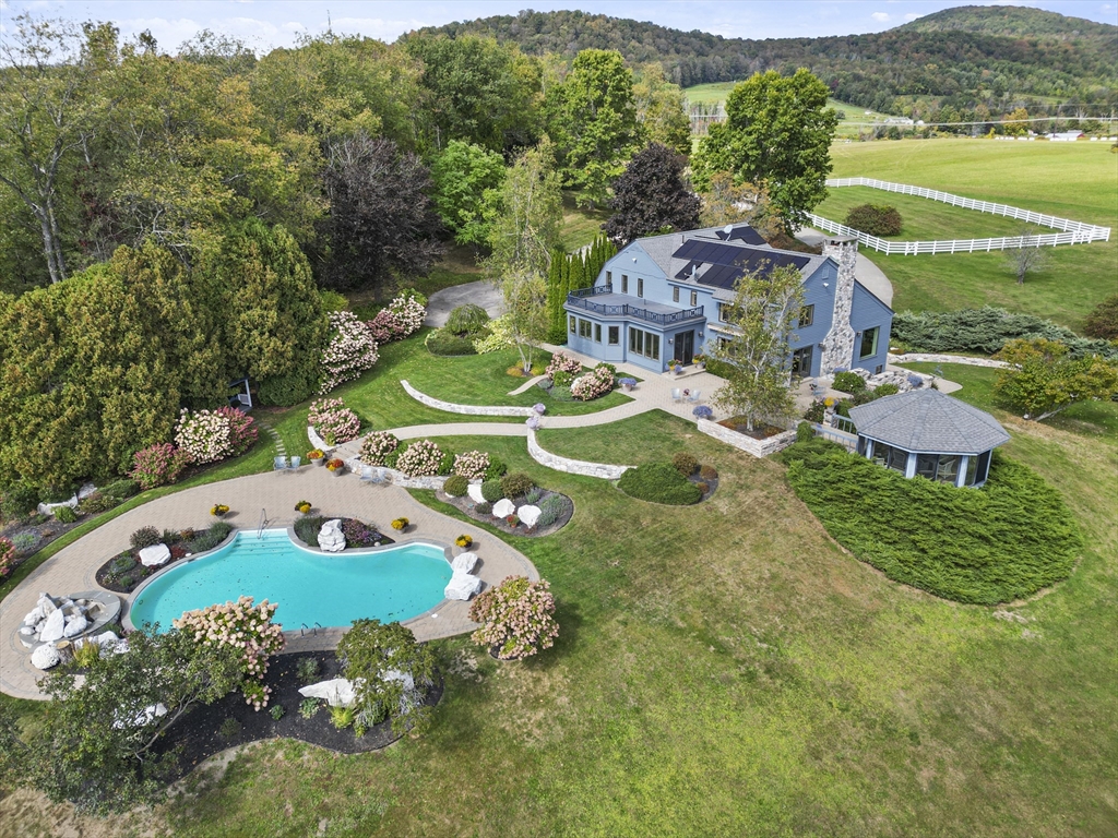 60 Old Cheshire Road Lanesborough, MA 01237 - Photo 1 of 42 an aerial view of a house with garden