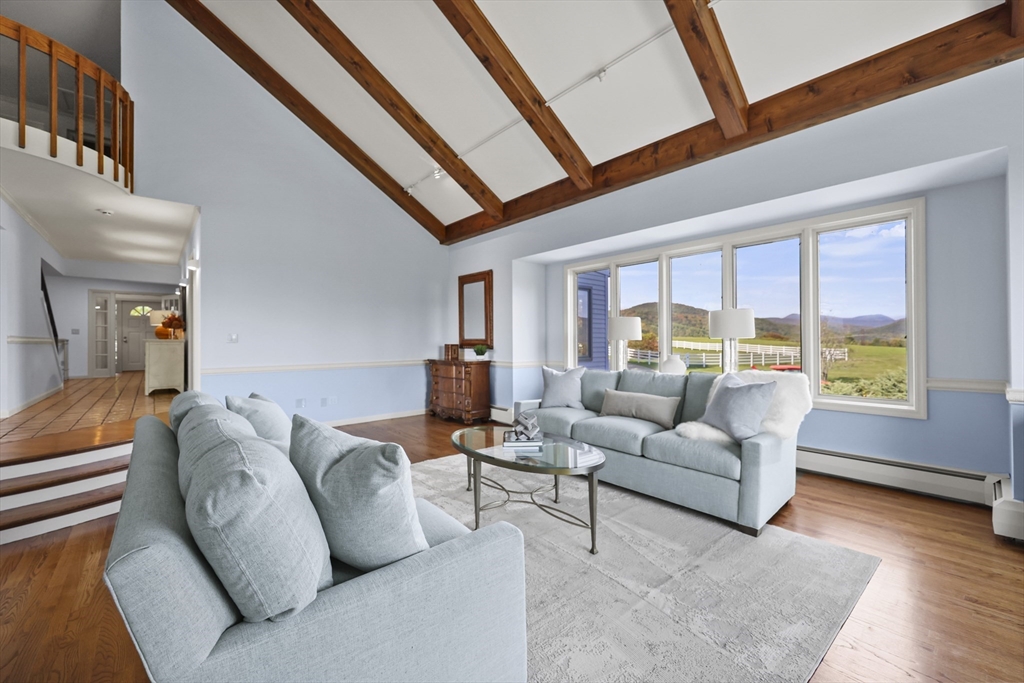 60 Old Cheshire Road Lanesborough, MA 01237 - Photo 11 of 42 a living room with furniture and a large window