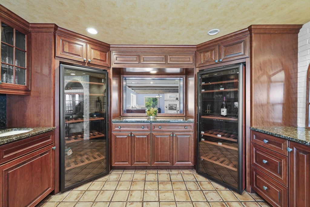 60 Old Cheshire Road Lanesborough, MA 01237 - Photo 20 of 42 a kitchen with granite countertop a refrigerator and a stove top oven