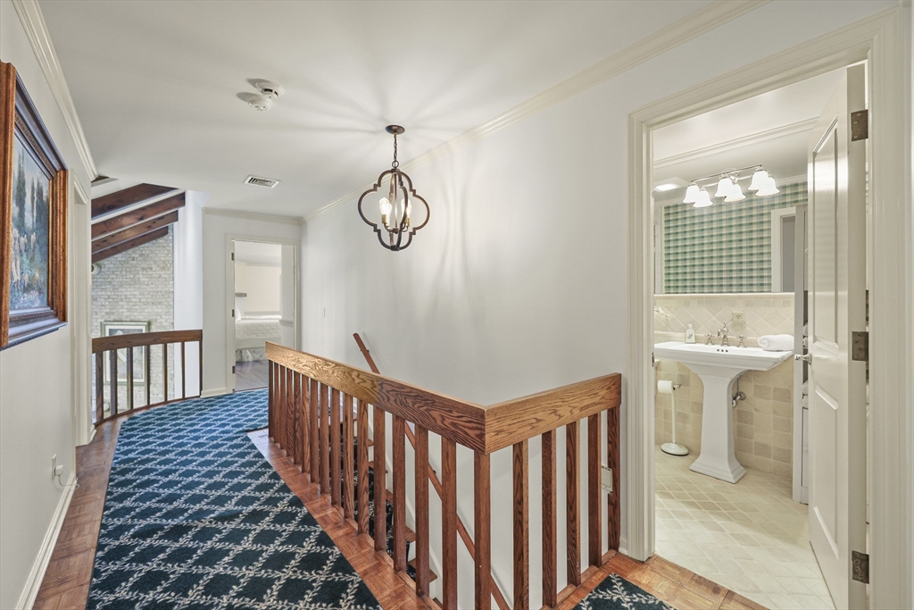60 Old Cheshire Road Lanesborough, MA 01237 - Photo 28 of 42 a view of a hallway with wooden floor and windows