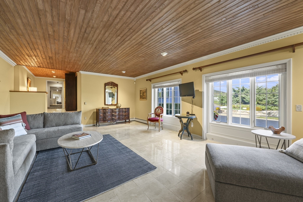 60 Old Cheshire Road Lanesborough, MA 01237 - Photo 37 of 42 a living room with furniture and a large window