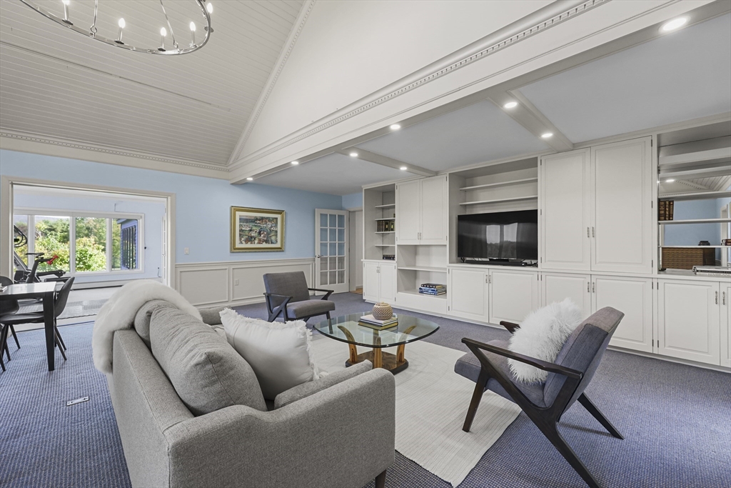 60 Old Cheshire Road Lanesborough, MA 01237 - Photo 6 of 42 a living room with furniture and a flat screen tv