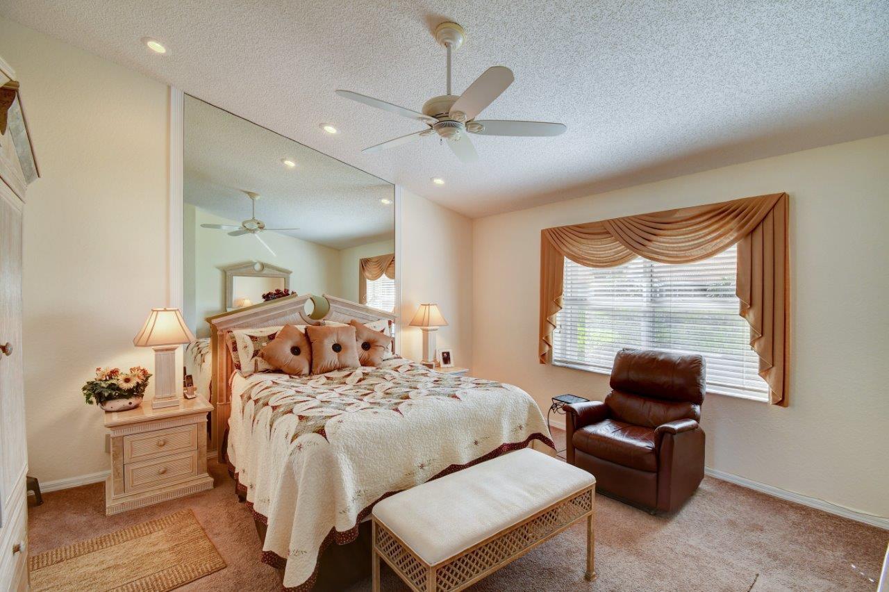 6104 Caladium Road Delray Beach, FL 33484 - Photo 15 of 43 a living room with furniture and a window