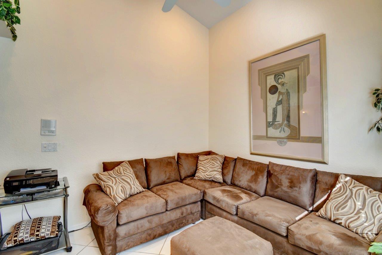 6104 Caladium Road Delray Beach, FL 33484 - Photo 28 of 43 a living room with furniture