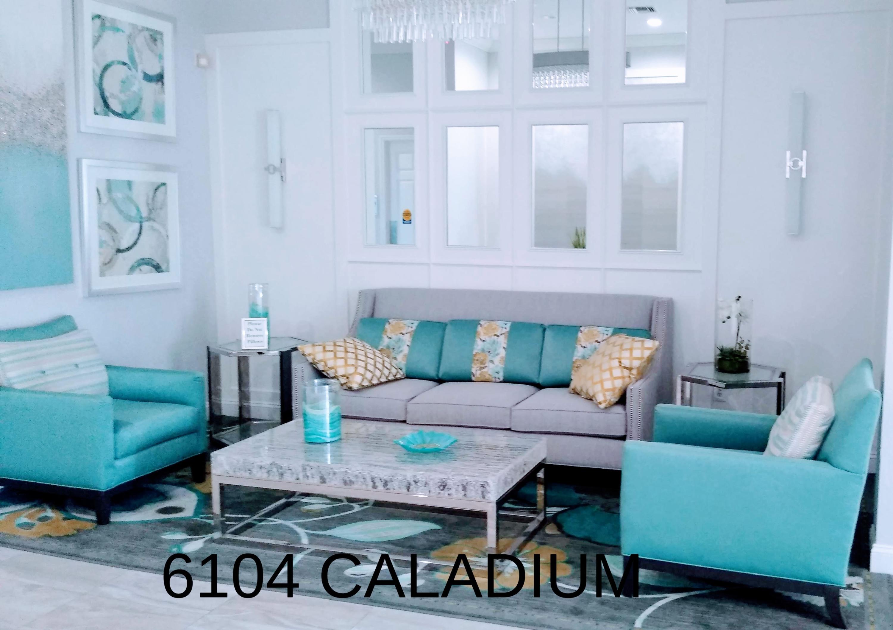 6104 Caladium Road Delray Beach, FL 33484 - Photo 36 of 43 a living room with furniture and a couch