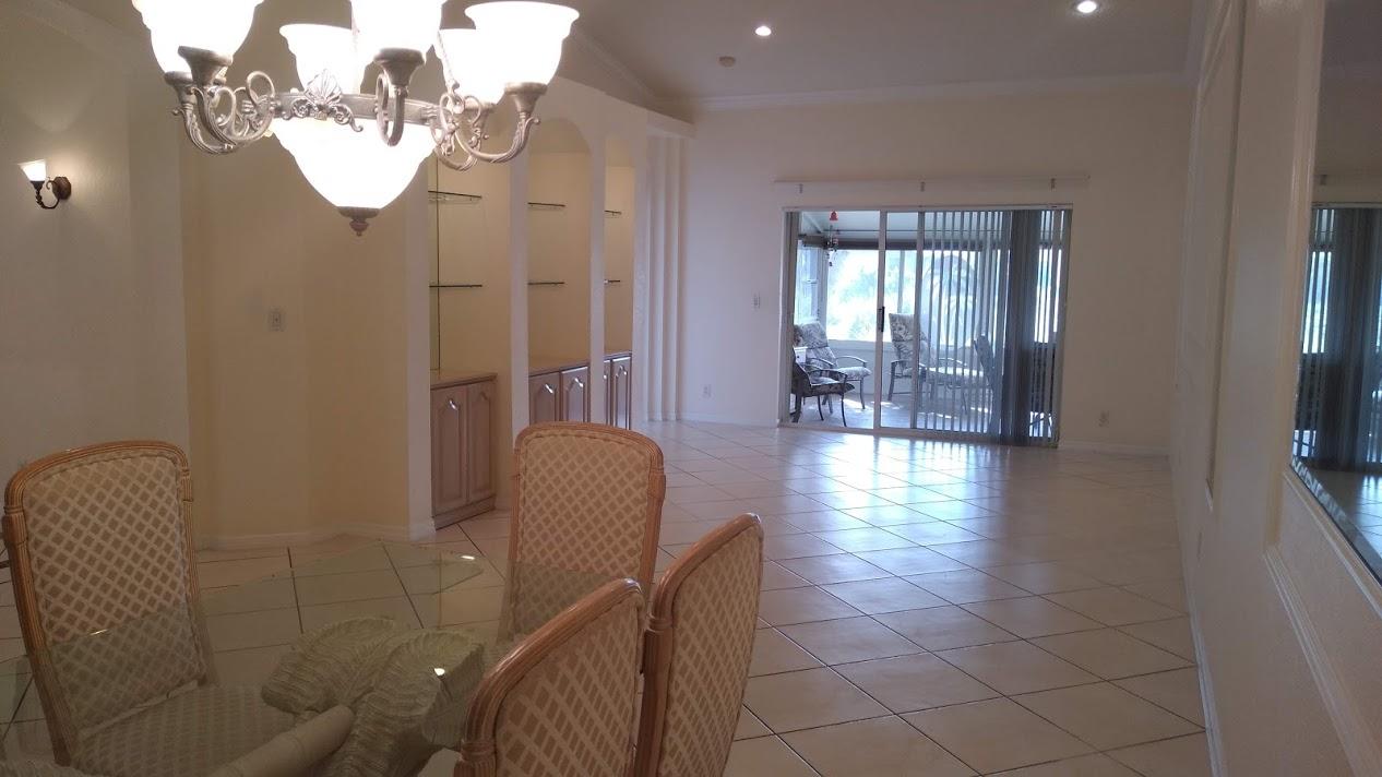 6104 Caladium Road Delray Beach, FL 33484 - Photo 41 of 43 a lobby with furniture and wooden floor