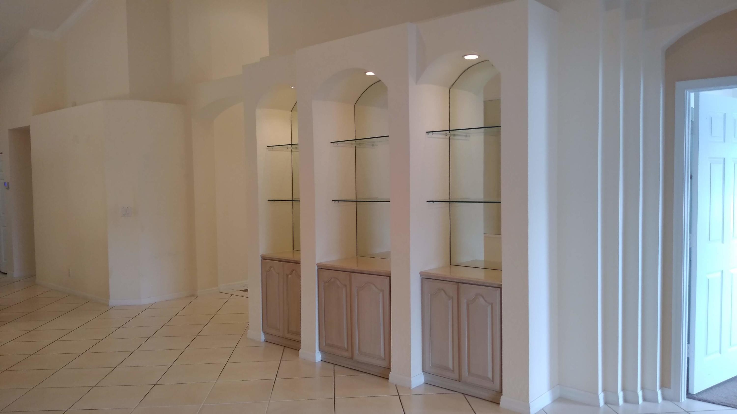 6104 Caladium Road Delray Beach, FL 33484 - Photo 43 of 43 a bathroom with a shower and a glass door