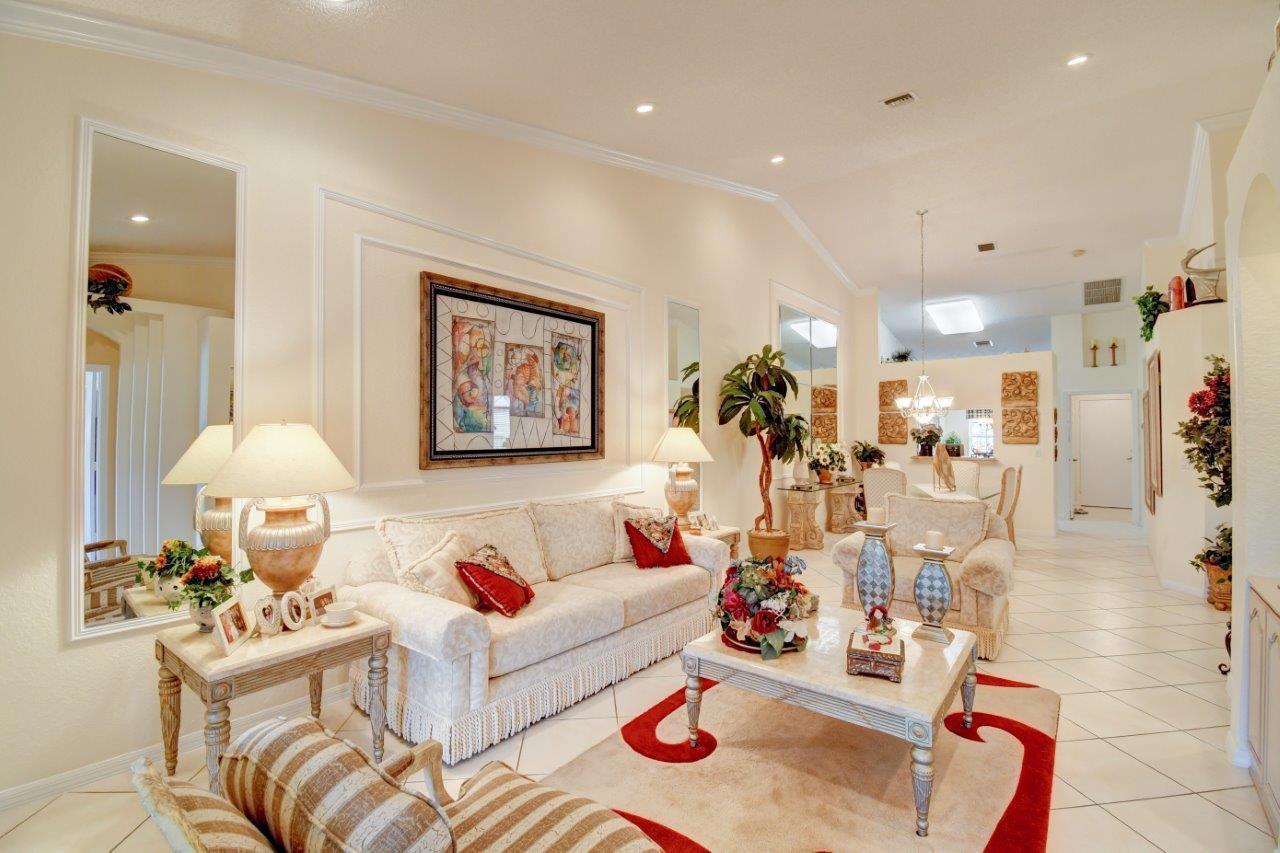 6104 Caladium Road Delray Beach, FL 33484 - Photo 7 of 43 a living room with furniture and a wooden floor