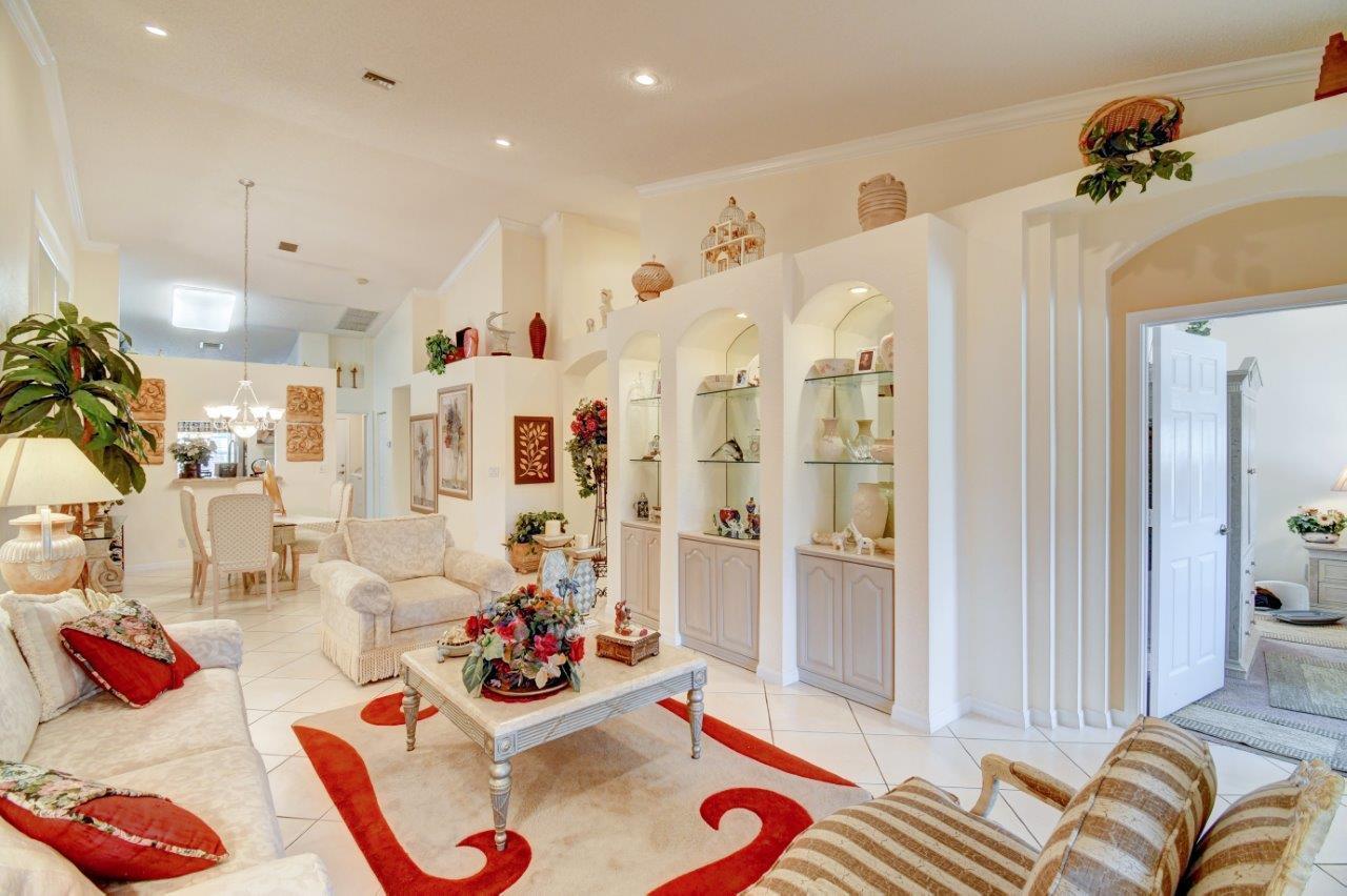 6104 Caladium Road Delray Beach, FL 33484 - Photo 10 of 43 a living room with furniture and a couch
