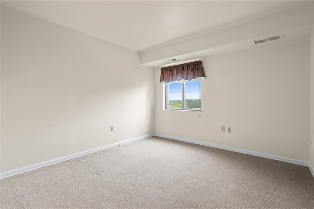 1500 Cochran Road, Unit 908 Pittsburgh, PA 15243 - Photo 23 of 27 Second bedroom could be an office or den.