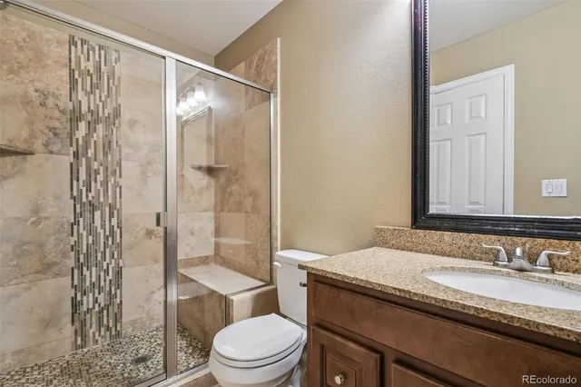 a view of an empty room with a fireplace