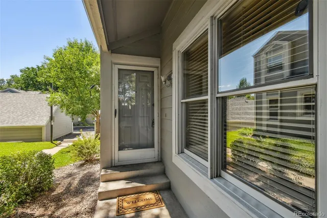 a view of a door and a window