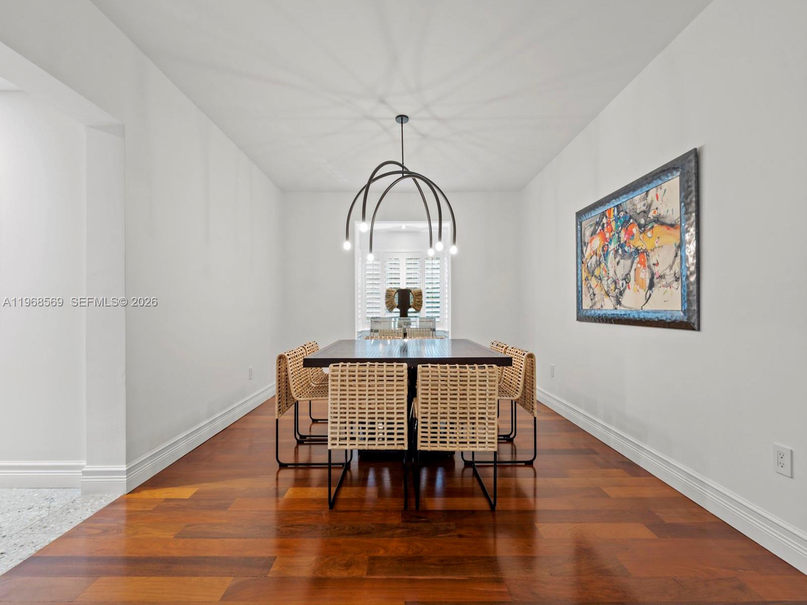 7218 Southwest 54th Court Miami, FL 33143 - Photo 11 of 47 a view of a room with furniture wooden floor and window