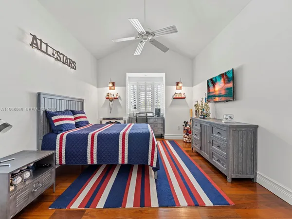 a living room with furniture fireplace and flat screen tv